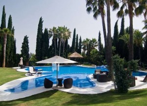 The 13 bedroom property features a large dynamic outdoor pool with waterfalls, bar and jacuzzi