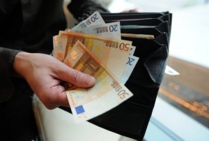 A handful of Euro banknotes 